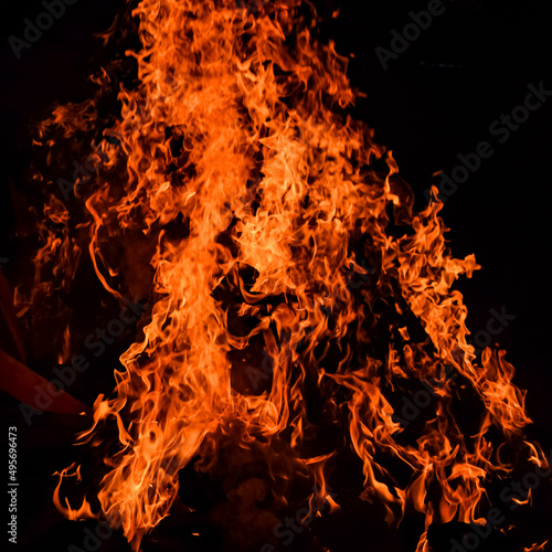 Fire flames on black background, Blaze fire flame texture background, Beautifully, the fire is burning, Fire flames with wood and cow dung