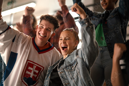 Canvas Print Excited fans supproting Slovak national team in live match at stadium