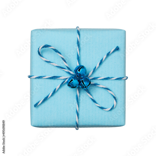 Christmas present box wrapped in blue paper with baker’s twine bow isolated on white background
