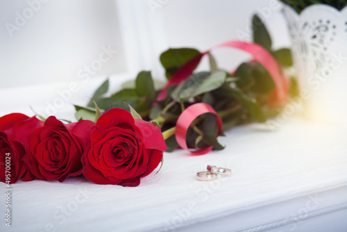 Rings and roses on the table