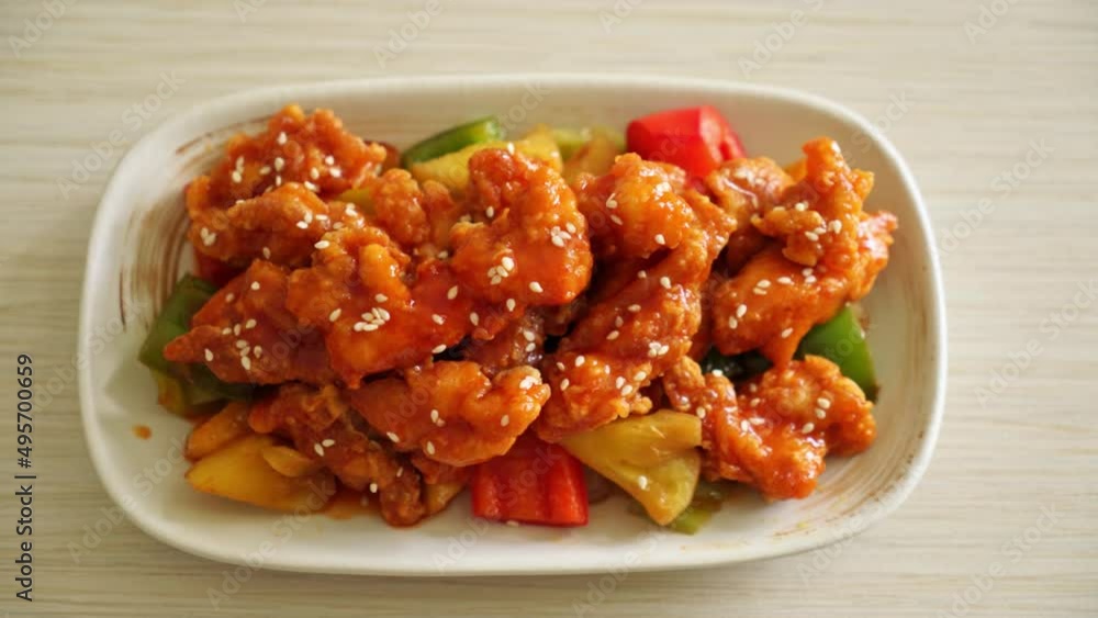 fried crispy chicken with sweet and sour sauce in Korean style fried crispy chicken with sweet and sour sauce in Korean style
