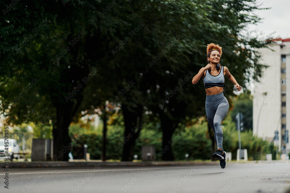 Runner running on the street. Runner running on the street.
