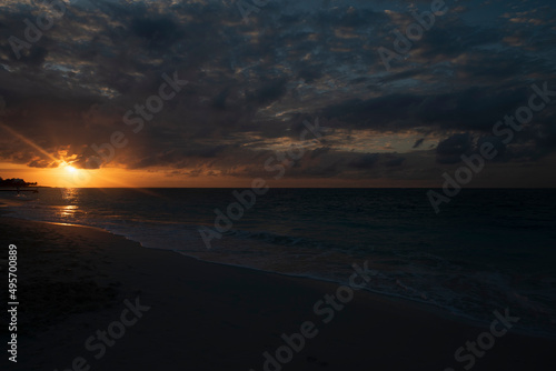 sunset or sunrise on the beach in turks and Caicos © julie
