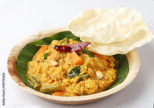 South Indian traditional vegetarian rice dish, bisi bele bath, Sambar rice with rice and pigeon pea as the main ingredients. photo