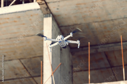 Drone flight near concrete structures. Observations on construction. Modern technology.