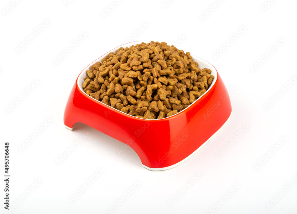 Food for cats and dogs in a bowl on a white background. Food for cats and dogs in a bowl on a white background.