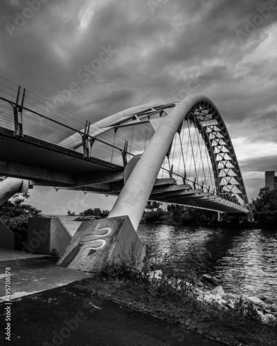 Photography Vertical grayscale shot of Humber Bay Arch Bridge