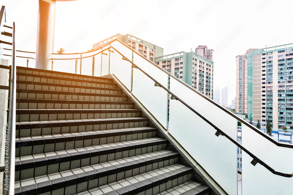 Staircase with glass railing in modern building Staircase with glass railing in modern building