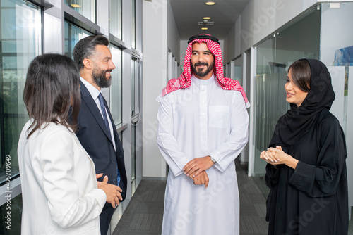 Multiethnic corporate business team meeting in the office for a strategic marketing plan - Office workers, entrepreneurs, and company employees at work in a multinational company