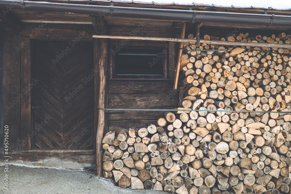 Front view of a woodpile at the old house in Spania Dolina, Slovakia - obrazy, fototapety, plakaty 