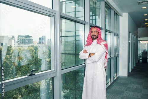 Attractive Arabian Business Man in a modern office  photo