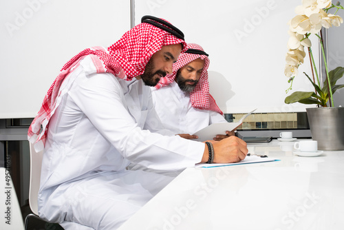 Arabian business coworkers in the office, Arabian businessmen working in the office 