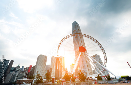 Photography Ferris wheel and office buildings in Hong Kong
