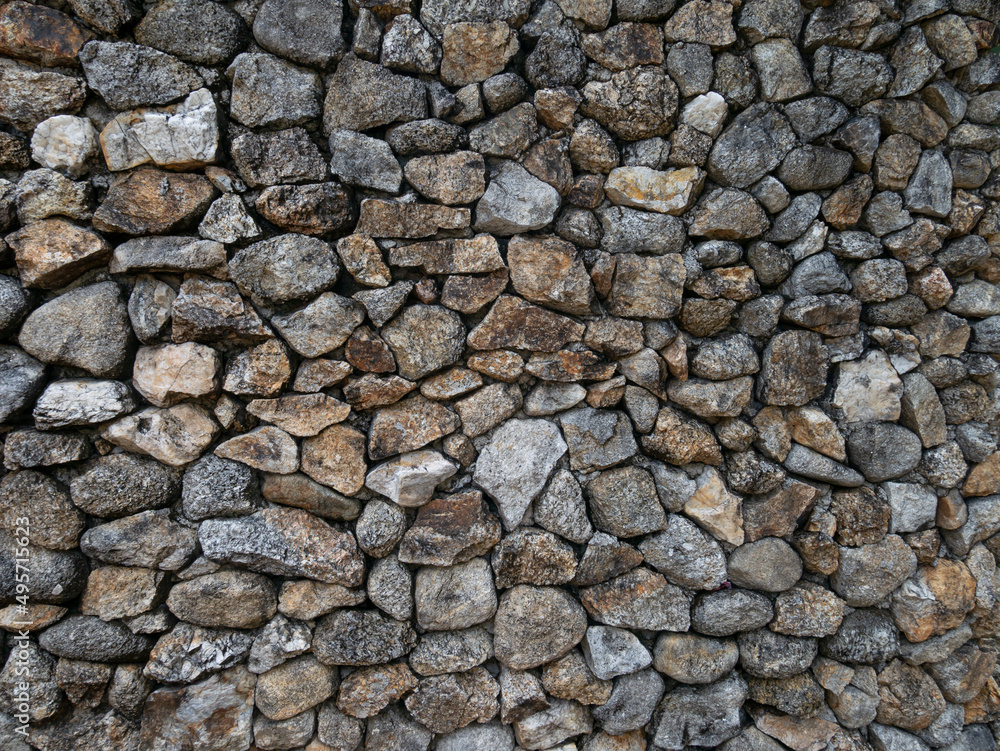 The walls are made of stacked stones. The walls are made of stacked stones.