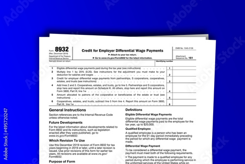 Form 8932 documentation published IRS USA 43567. American tax document on colored