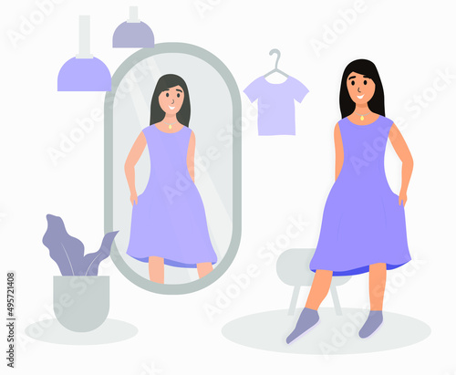 A woman tries on a dress in front of a mirror. The concept of trying on clothes. Fashion clothes. Score