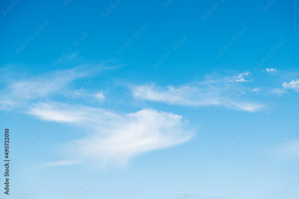 Blue sky with white clouds background