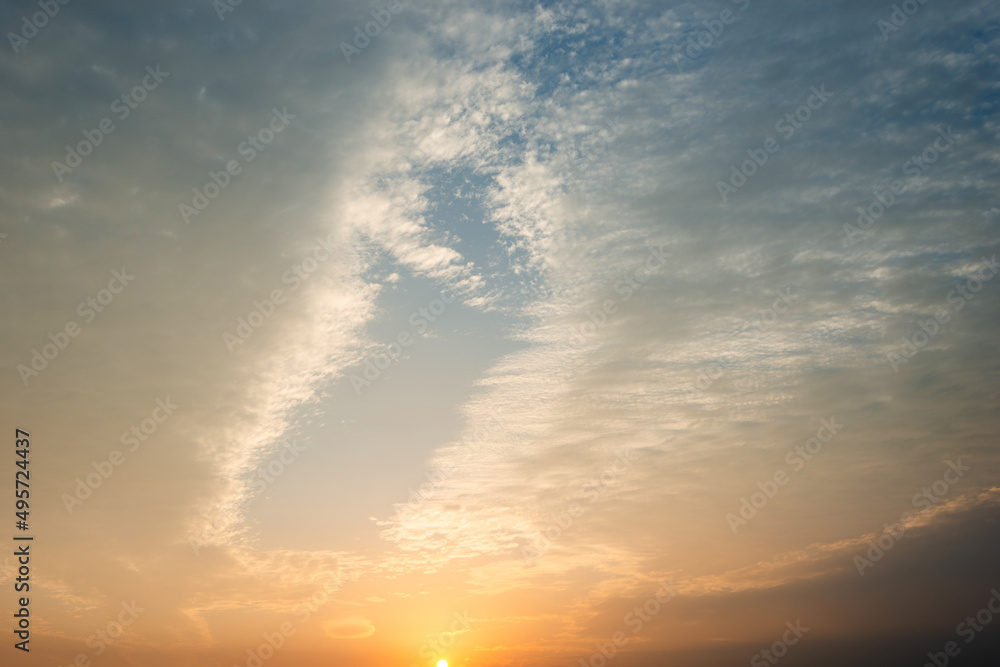 Fototapeta premium Sunset sky with white clouds