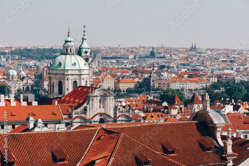 Canvas Print Roofs of Prague with Saint Nicholas Cathedral