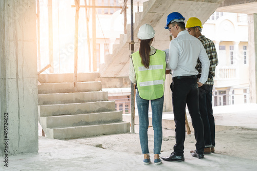 Принти на полотні Asian contractor and engineer inspecting material in construction building