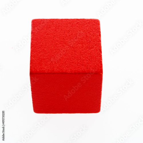 Single wooden block on white background