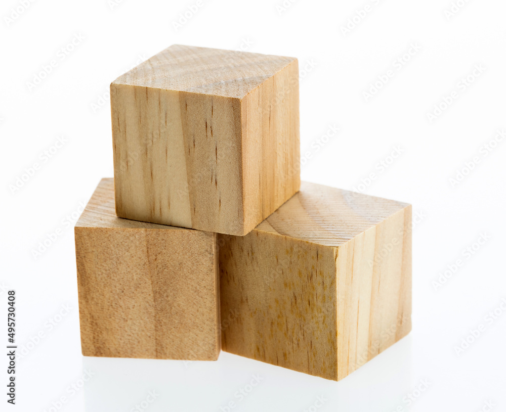 Three wooden blocks on white background Three wooden blocks on white background