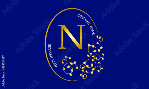 Exquisite gold monogram, logo, invitation, greeting card, business sign or any desired idea on a dark background with the letter N in the center.