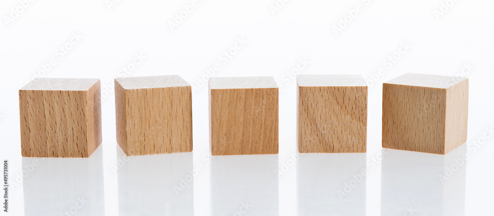 A row of building blocks on white background A row of building blocks on white background