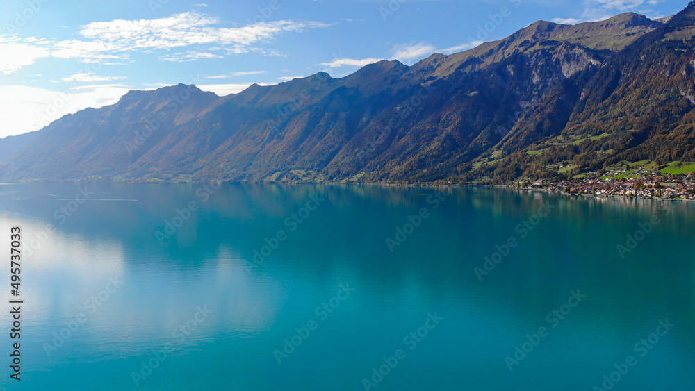 The crystal clear blue water of Lake Brienz in the Swiss Alps - Switzerland from above