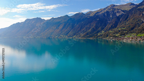 Fototapeta Naklejka Na Ścianę i Meble -  The crystal clear blue water of Lake Brienz in the Swiss Alps - Switzerland from above