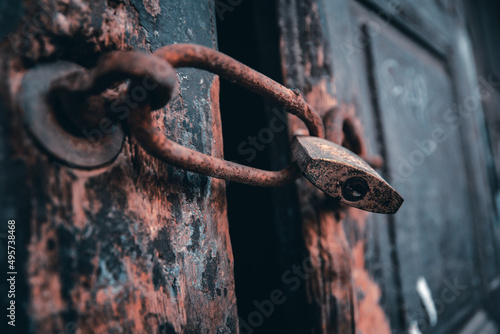 Rusty lock on an old weathered door in Chania, Crete