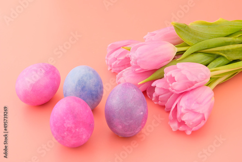 Beautiful pink tulips and Easter eggs, pink, blue, blue. Easter concept. Greeting card, trend color