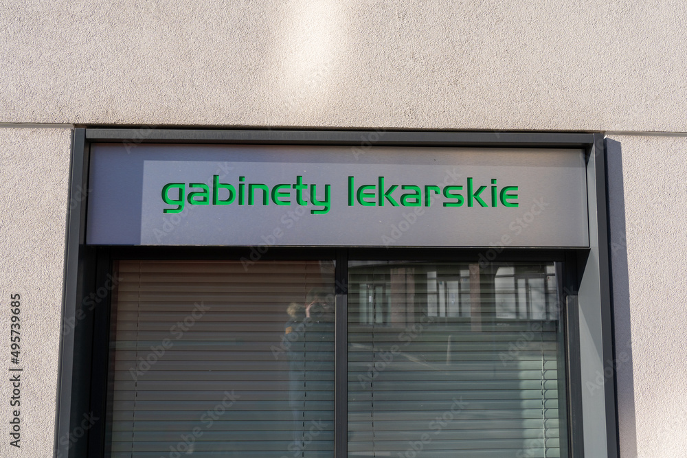 signboard over the shop window: 