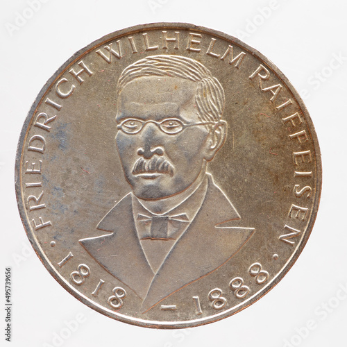 Germany - circa 1968: a 5 Deutsche Mark coin of the Federal Republic of Germany showing a portrait of the German social reformer and local government official Friedrich Wilhelm Raiffeisen
