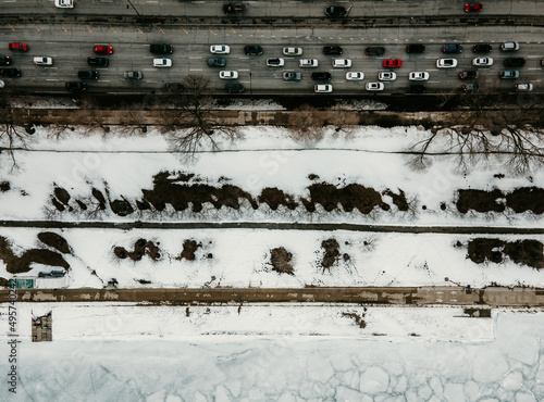 Top view shot of a bunch of cars on a brifge in winter photo