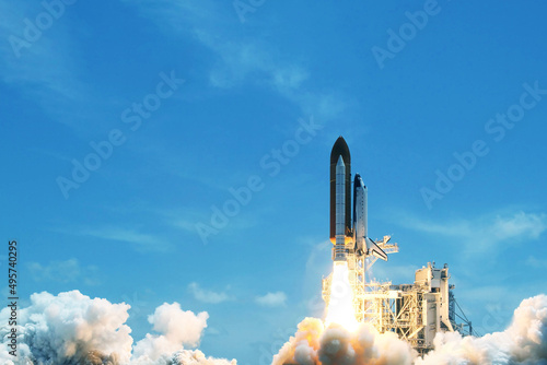 Fototapeta Naklejka Na Ścianę i Meble -  Rocket launch into space. Elements of this image furnished by NASA