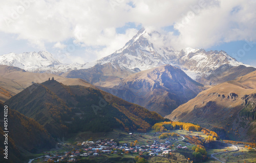 Mount Kazbek and Stepantsminda town in Georgia photo