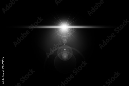 abstract lens flare white light over black background