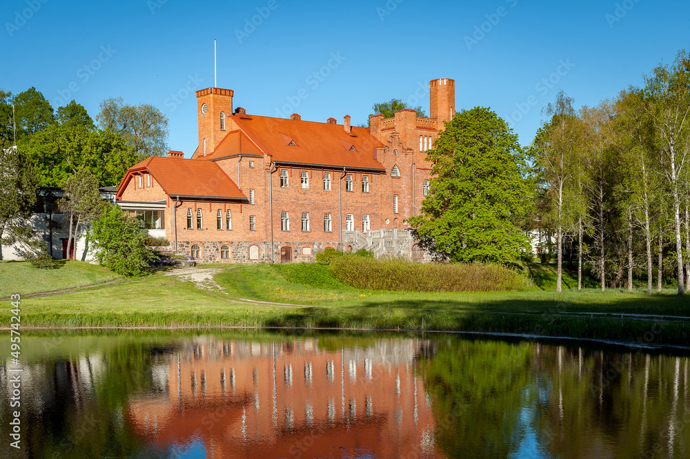 Old red brick manor house (1913-1915) in Janeda. Estonia, Baltic States, Europe