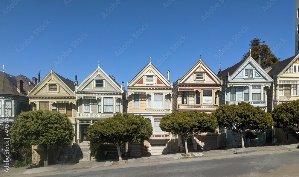 san francisco architecture painted ladies in the day colorful buildings with blue sky direct straight front shot