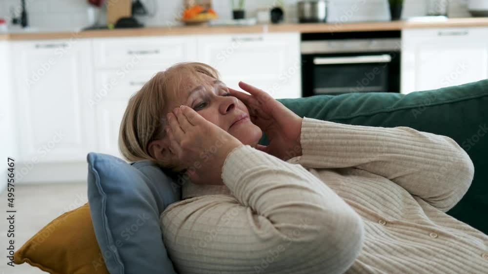 Elderly Mature Woman Is Tormented By Migraines And Headaches Elderly Mature Woman Is Tormented By Migraines And Headaches