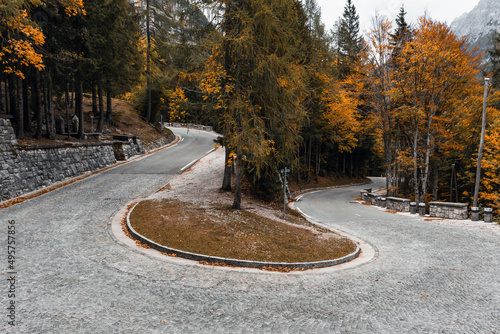 Hairpin turn on Vrsic mountain pass road in autumn in the Julian Alps, Slovenia