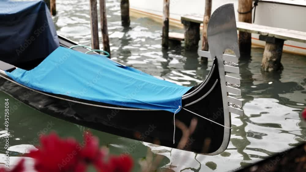 Venice, Italy - gondolas and gondoliers in the Grand Canal near the Rialto Bridge, in the San Marco Basin and between the canals of the lagoon city Venice, Italy - gondolas and gondoliers in the Grand Canal near the Rialto Bridge, in the San Marco Basin and between the canals of the lagoon city