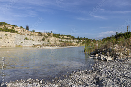 Small pond with dirty water in one of the quarries of Guanabacoa, Havana, Cuba photo