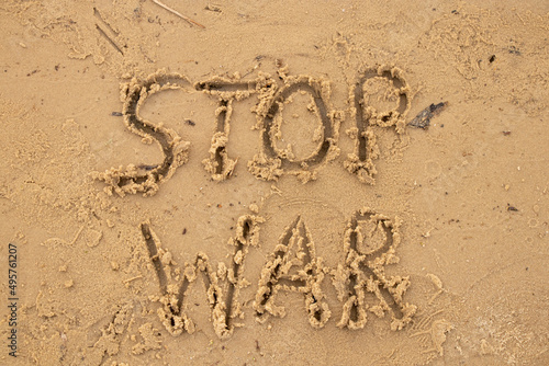 Stop war written on the sand on the banks of the Dnieper River in Ukraine, a protest