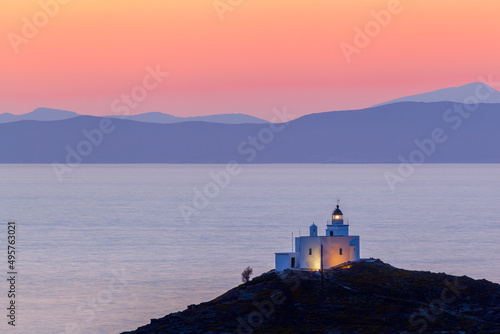 Beautiful sunset with the lighthouse of Vourkari village, in Kea (or Tzia) island, in Cyclades islands, Aegean Sea, GREECE, Europe © YiannisMantas