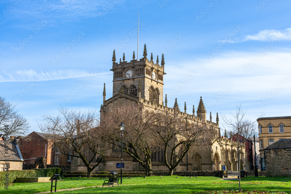 All Saints' Church, also known as Wigan Parish Church.  Originally built in the 13th century with additions in the 16th and 17th centuries, this Anglican church is Grade II listed.