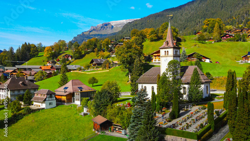 Famous city of Grindelwald in the Swiss Alps from above - drone footage photo