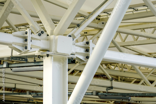 the point of connection of steel supports, beams and crossbeams in the structure of the building © Zigmunds
