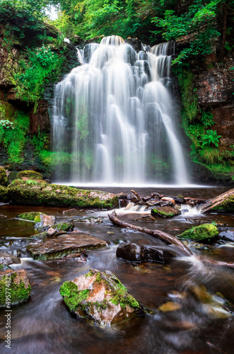 A waterfall flows  Lynn Falls  Caaf Water  Lynn Glen  Dalry  North Ayrshire  Scotland  UK
